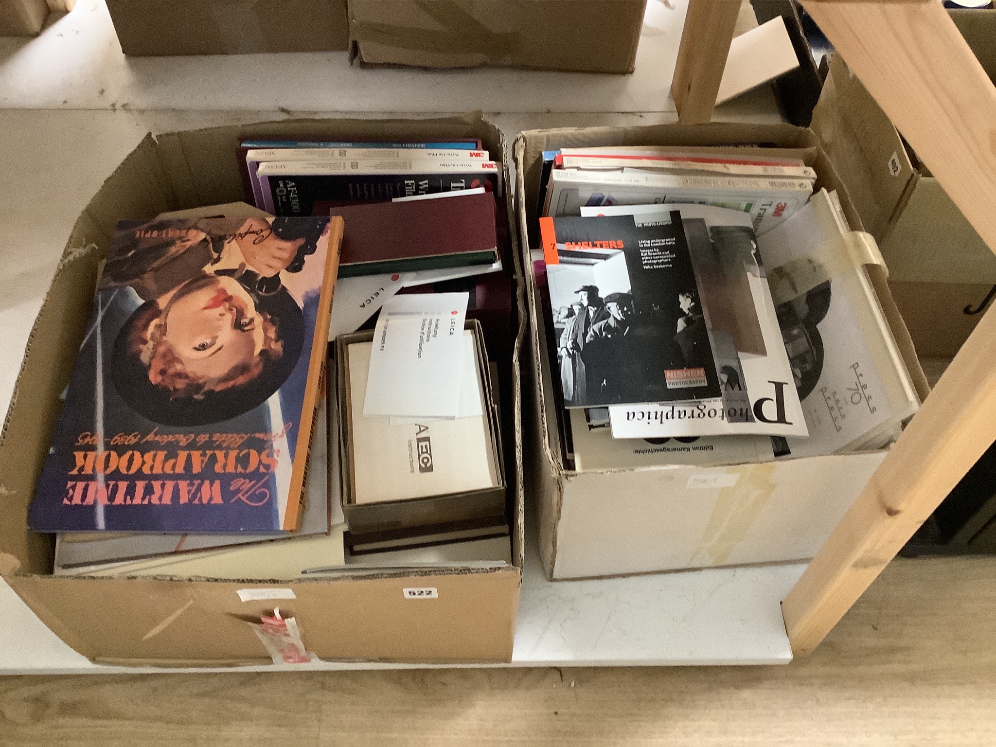 A large and wide-ranging collection of books and other written material relating to photography and cameras, to include various camera manuals, numerous editions of ‘Leica Fotografie’, books on wartime poster design and